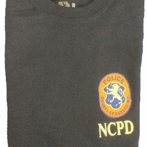 Black t-shirt with NCPD police emblem on the front.