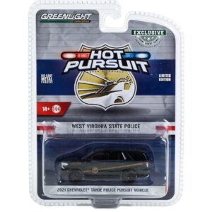 Hot Pursuit GreenLight collectible police car in packaging.