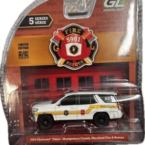 Packaged toy paramedic SUV with fire badge