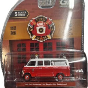 Red toy fire department ambulance in packaging