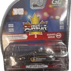 Die-cast police car in Hot Pursuit packaging