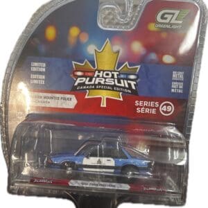 Toy RCMP police SUV in packaging